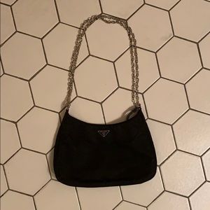 Gentle worn Prada bag